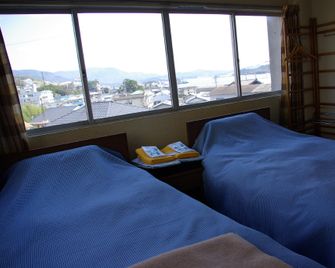 Hotel New Kaifu - Tonosho - Camera da letto