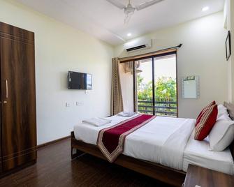 Vivaant Retreat and Conventions. - Igatpuri - Schlafzimmer