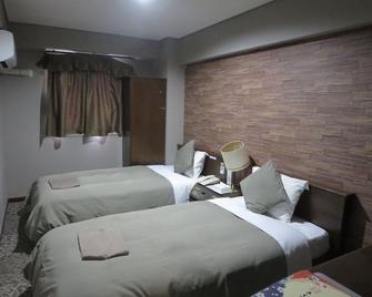 Hotel Rumieru Hyuga - Hyuga - Bedroom