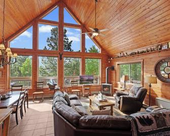 Family Cabin with looking up at back of Pikes Peak - Divide - Living room