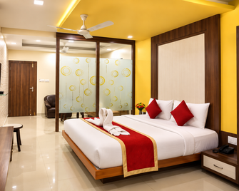 Hotel Shubhashree Comfort - Bijapur - Bedroom