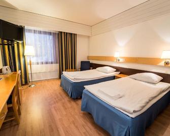 Hotelli Sodankylä - Sodankylä - Schlafzimmer