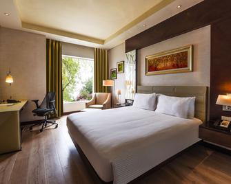 DoubleTree by Hilton Gurugram Baani Square - גורגאון - חדר שינה