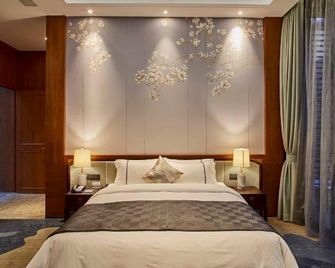 Spring Posh Roadsun International Hotel & Resort - Zhangjiajie - Habitación