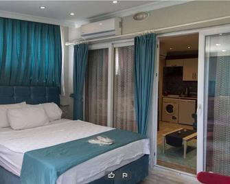 Sirinyer Elite Residence Apart Hotel - Buca - Bedroom