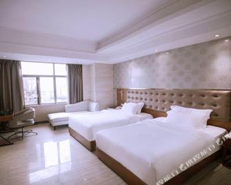 Baifulai Hotel (Wanning High-speed Railway Station) - Wanning - Bedroom