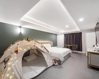 Brighton Hotel - Чонджу - Спальня