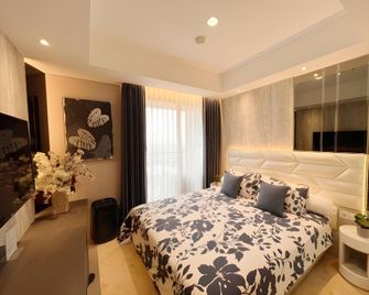Gold Coast Sea View Apartments by PremiumStay - 雅加達 - 臥室