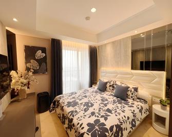 Gold Coast Pik Premium Sea View Apartments - Jakarta - Schlafzimmer