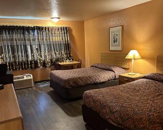 Hillcrist Motel - Aurora - Bedroom