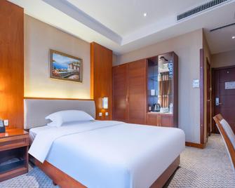 Hongcui Garden Hotel (Linyi Taisheng Plaza Branch) - Linyi - Quarto