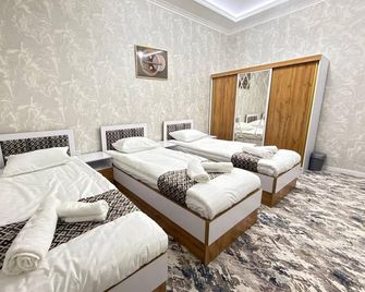 Hotel Bekh - Samarqand - Schlafzimmer