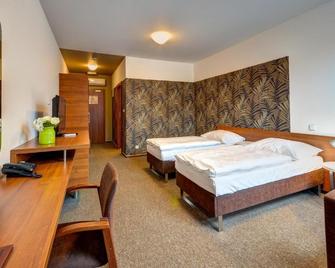 Hotel Iberia - Troppau - Schlafzimmer