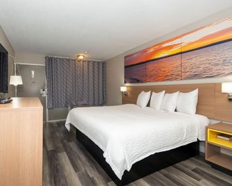 Days Inn & Suites by Wyndham Dayton North - Dayton - Camera da letto