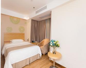 Greentree Inn Zhongshan West District Fuhua Road Branch - Zhongshan - Slaapkamer