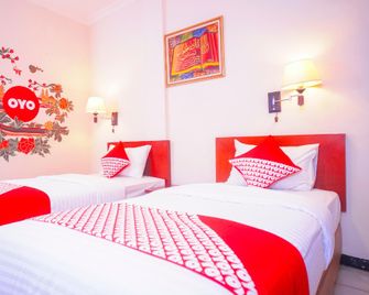 Capital O 142 Hotel Al Furqon Syariah - Palembang - Habitación