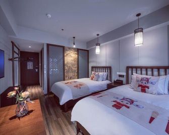 Grand Cozy Hotels - Nanjing - Schlafzimmer
