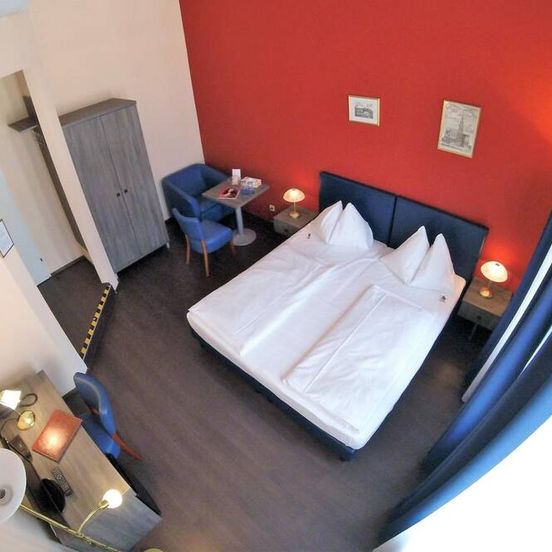 Bedroom view of Hotel Pension Excellence