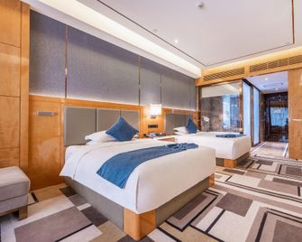 Hetian Tianwang International Hotel - Hotan - Camera da letto