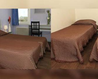 Hôtel Motelia - Moissy-Cramayel - Habitación