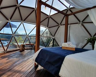 Domus Glamping - Guatapé - Schlafzimmer