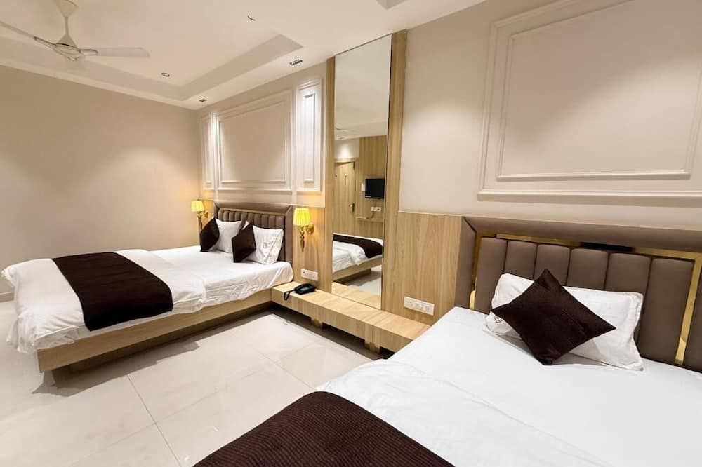 Hotel Rk Residency - אויאיין - חדר שינה