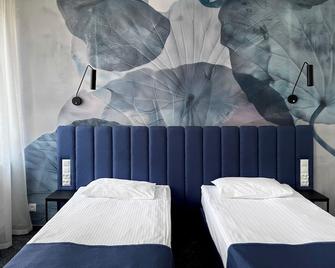 هوتل سزيدلوسكي - غدانسك - غرفة نوم