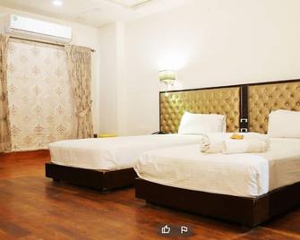 Khayyam Hotel & Restaurant - Faisalābād - Bedroom