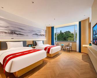 Xinhua International Hotel - Zhongwei - Bedroom