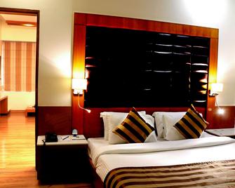 Comfort Inn Lucknow - ลัคเนา - ห้องนอน