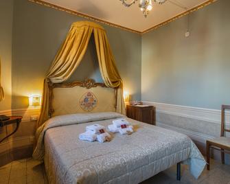 I Portici Hotel - Residenza D'Epoca - ארצו - חדר שינה