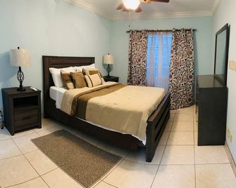 Lovely one bedroom apartment 8-10 minutes walk to Grace Bay Beach(May Promotion) - Providenciales - Sypialnia