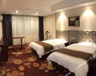 Tianhai Yifeng Hotel - Jiujiang - Quarto