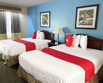 Bonita Lakes Inn by Capital O Meridian I20 - מרידיאן - חדר שינה