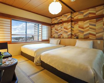 Hotel New Gaea Iizuka - Iizuka - Slaapkamer