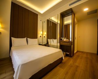Alkan Palace Hotel - Kesan - Schlafzimmer
