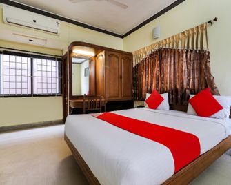 OYO Flagship Nstar Heritage - Tiruppur - Habitación