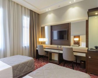 Hotel Senator - Karaganda - Schlafzimmer