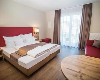 Hotel-Gasthof Neue Post - Oberdachstetten - Bedroom