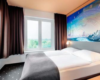 بي آند بي هوتول روستوك هافين - روستوك - غرفة نوم