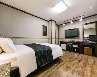 Sharp Hotel - Andong - Habitación