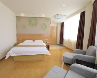Greentree Inn Zibo Hengtai Bus Station Express Hotel - Zibo - Спальня