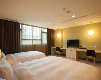 823 Tourist Hotel - Jinhu Township - Bedroom
