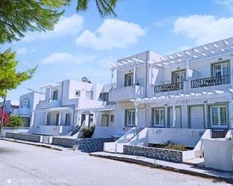 Anna Zisimos - Adamantas - Edificio