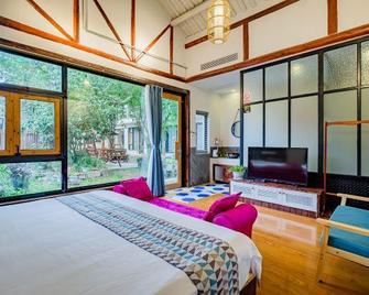 Nanzha Fuchang Bridge Family Vacation Homestay (Wuzhen Scenic Area Branch) - Jiaxing - Schlafzimmer