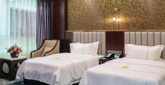Annan Hotel - Chaozhou - Schlafzimmer