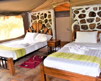 Elangata Olerai Luxury Tented Camp - Ololaimutiek - Bedroom