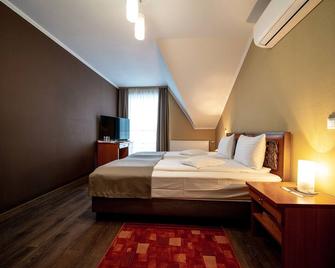 Areo Hotel & Restaurant - Odorheiu - Bedroom