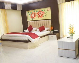 Hotel Mannat International - Digha - Schlafzimmer