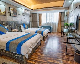 Zhangjiajie Mr.F Boutique Hotel (Tianmen Mountain Cableway Station) - Zhangjiajie - Makuuhuone